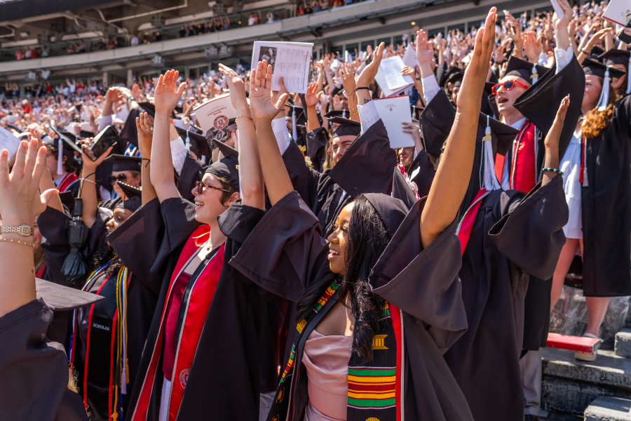 Students singing at graduation