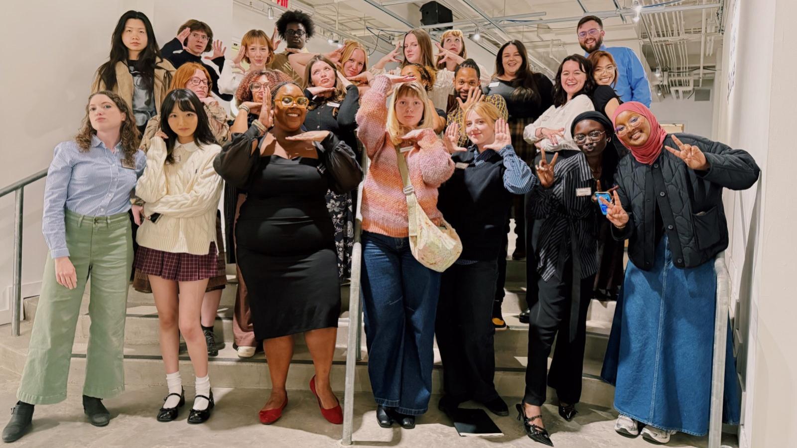 students pose fashionably for a group photo